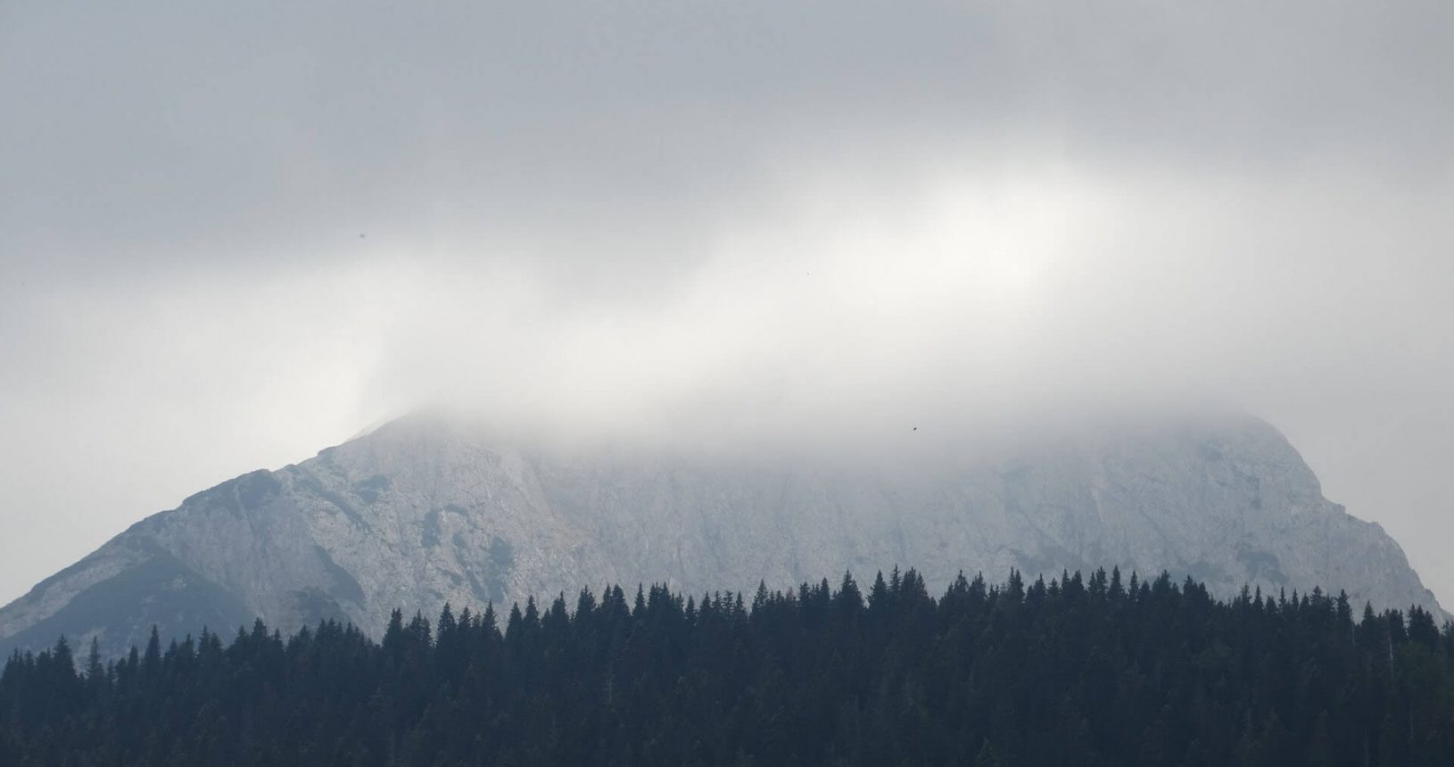 Mountain peak in the clouds National Park Durmitor