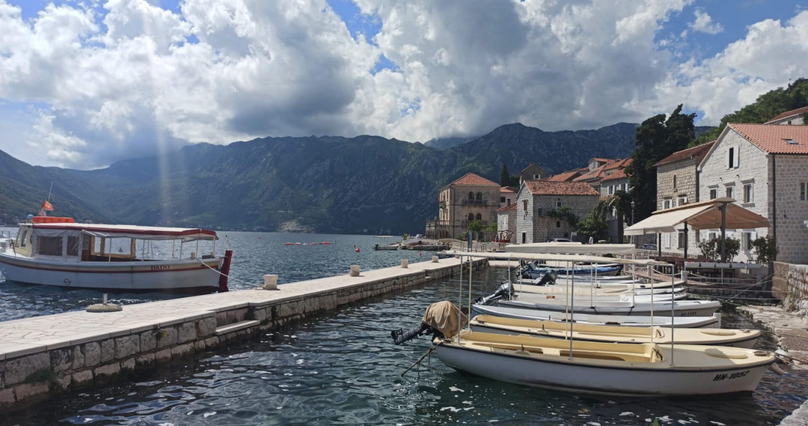 Boats and mountains view in Perast
