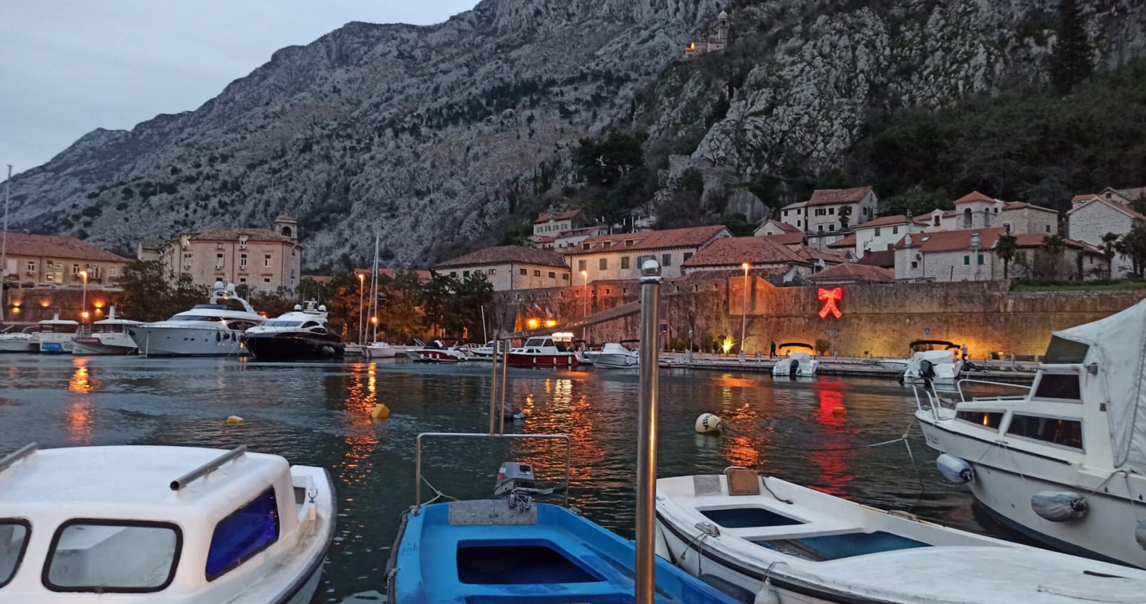 The view to mountains and Kotor castle at night