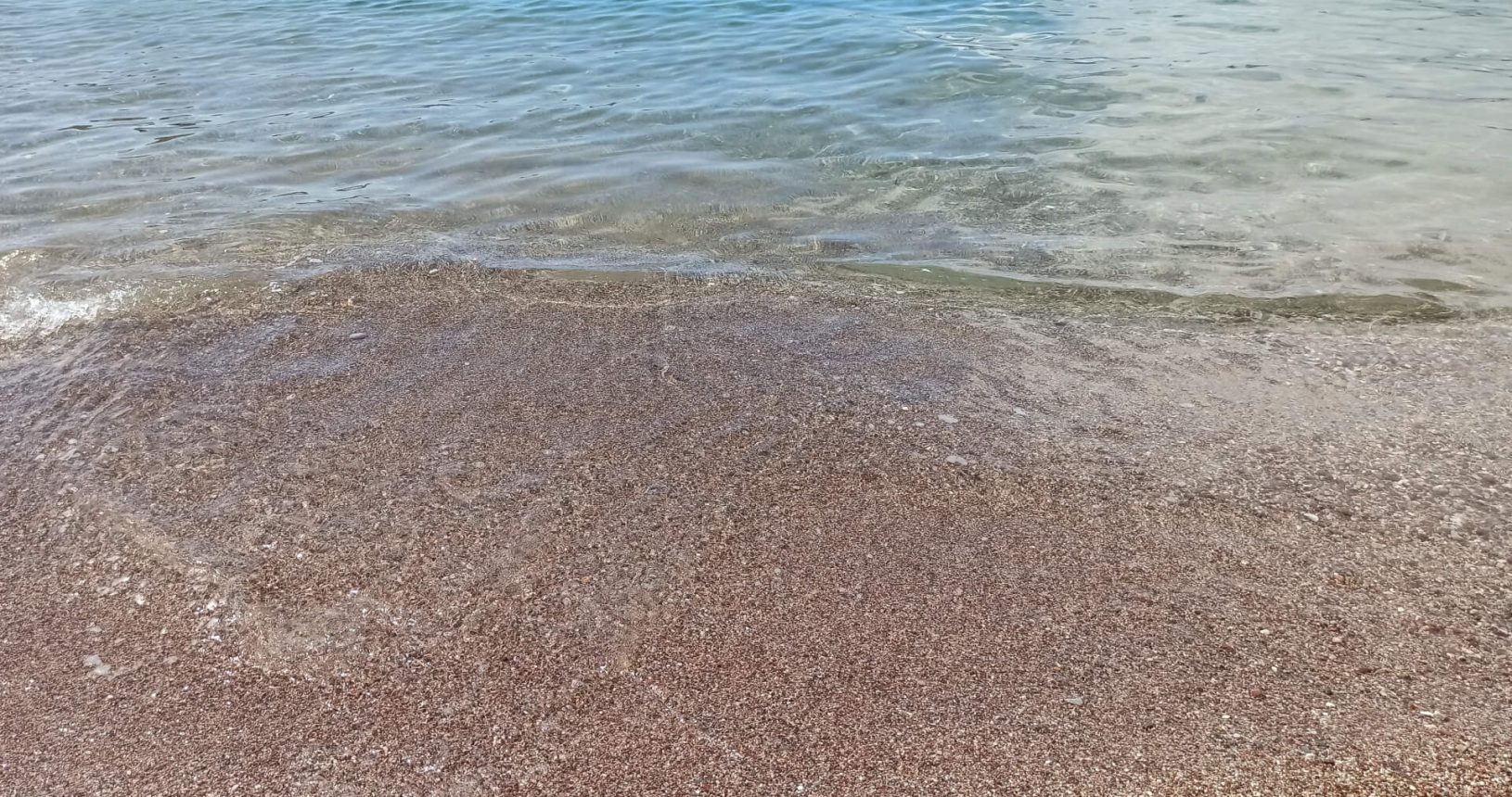 Beautiful transparent water at Przno beach