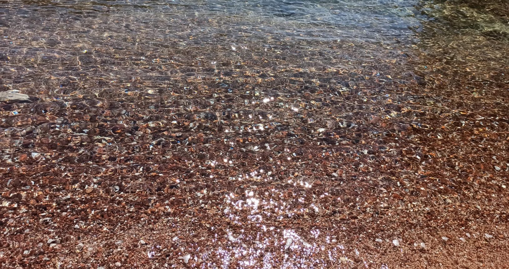 Fantastic bright transparent water at Queens beach
