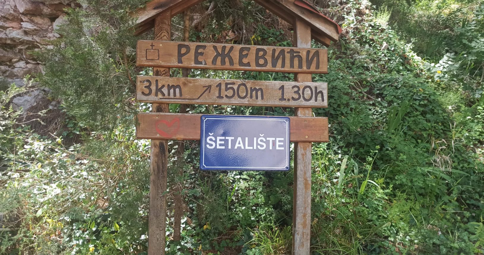 Walking trail Petrovac Rezevici. Sign at the beginning in Petrovac