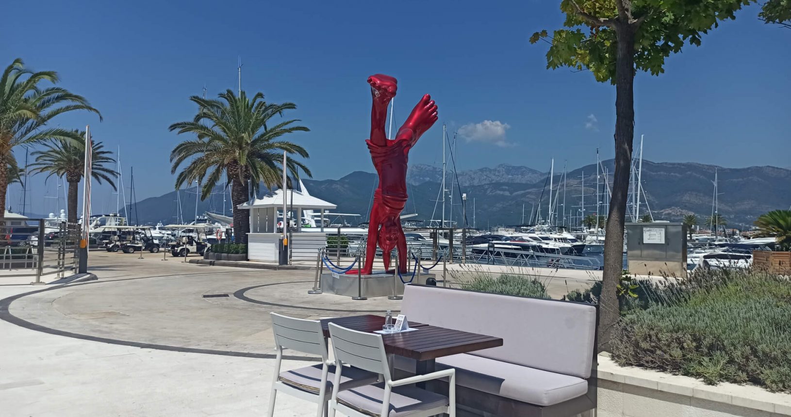 Summer sculpture 2 from behind the table in Porto Montenegro