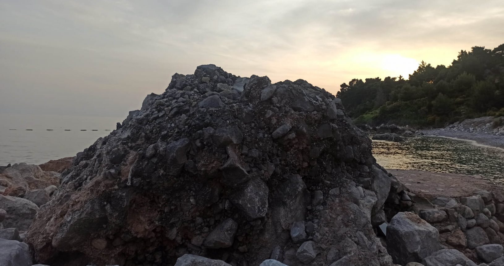 Big stone at wild beach
