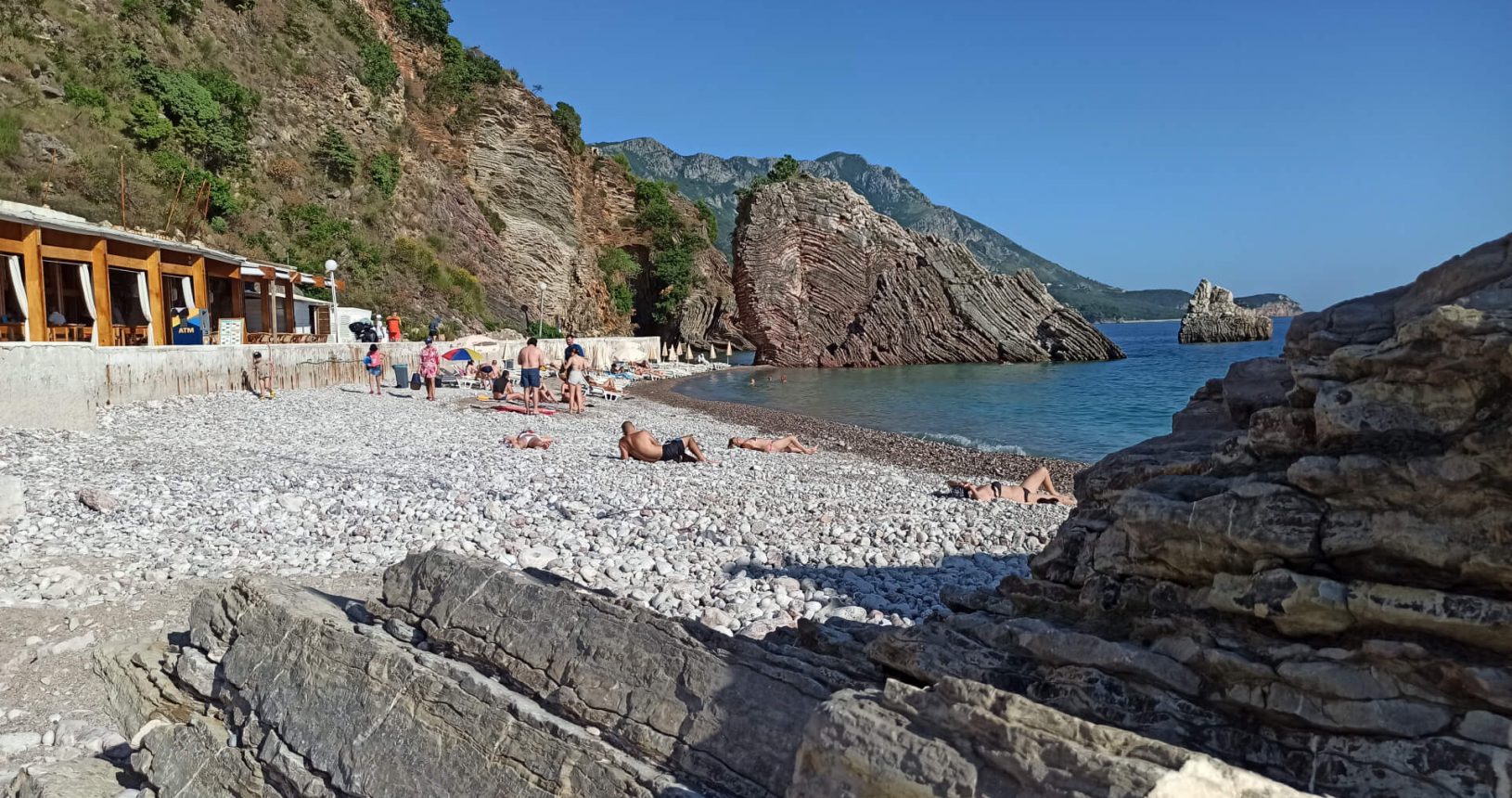 Rafailovici rocky beach from behind beautiful rocks