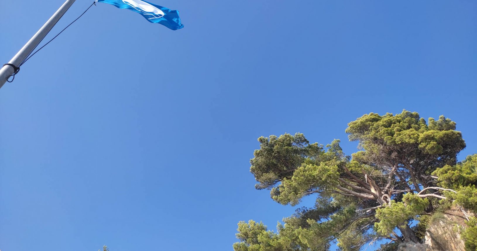 The view to Ponta Beach Club blue flag