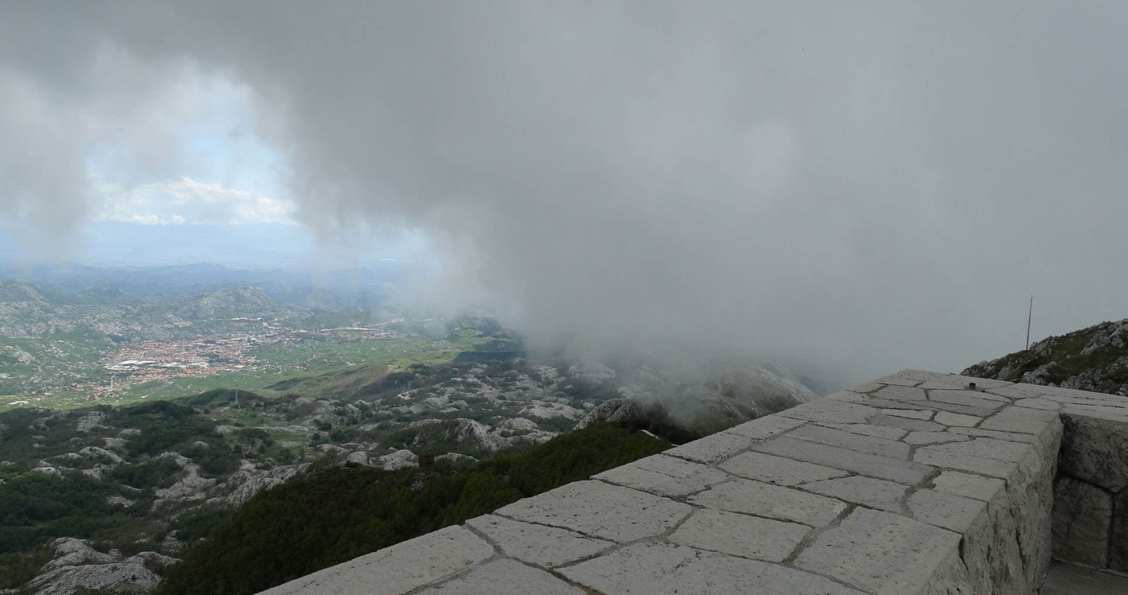 Lovcen National Park surrounded by fluffy clouds