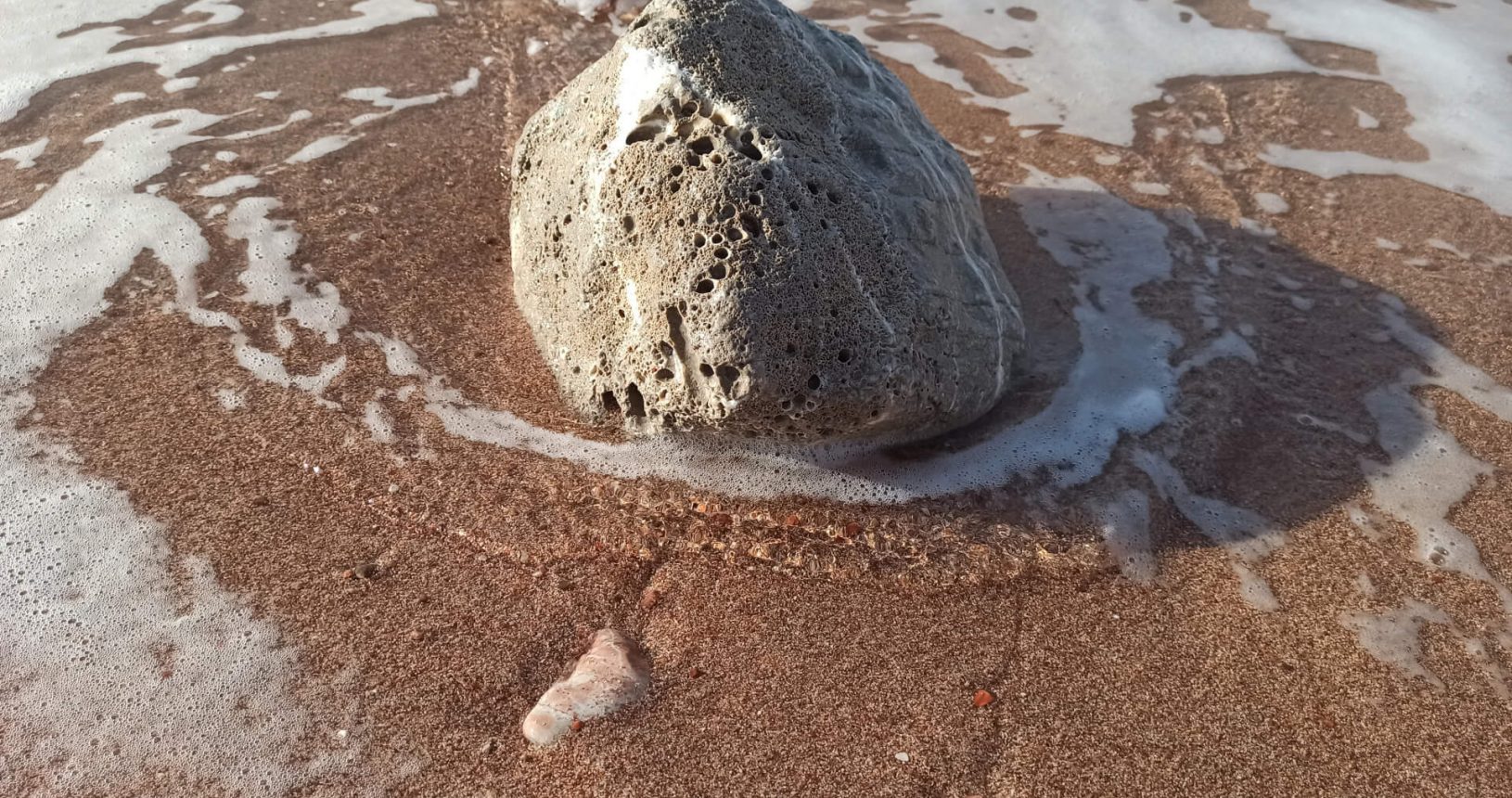 Big stone at the beach. Sveti Stefan beach 2