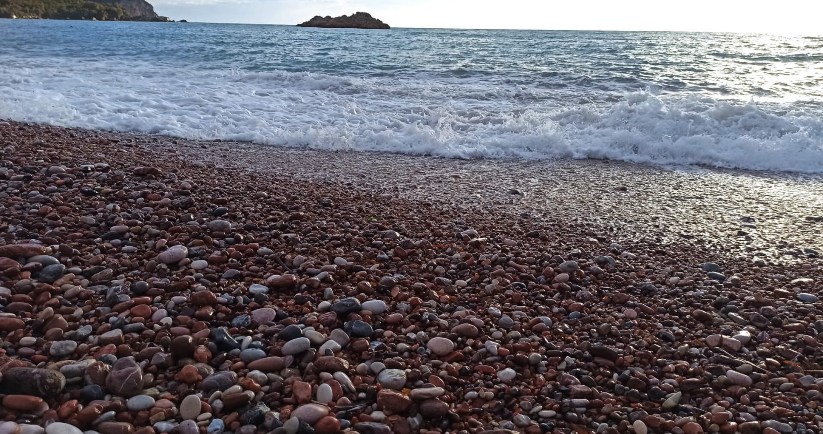Red pebble at Sveti Stefan beach