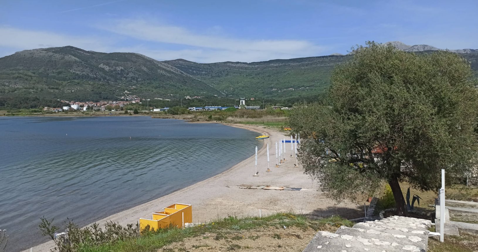 Entrance to Kalardovo beach. Riviera and airport view