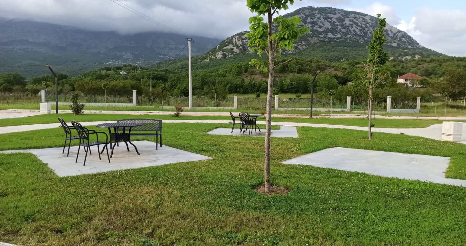 Tables and chairs for family picnic. Hajdari Family Public Park