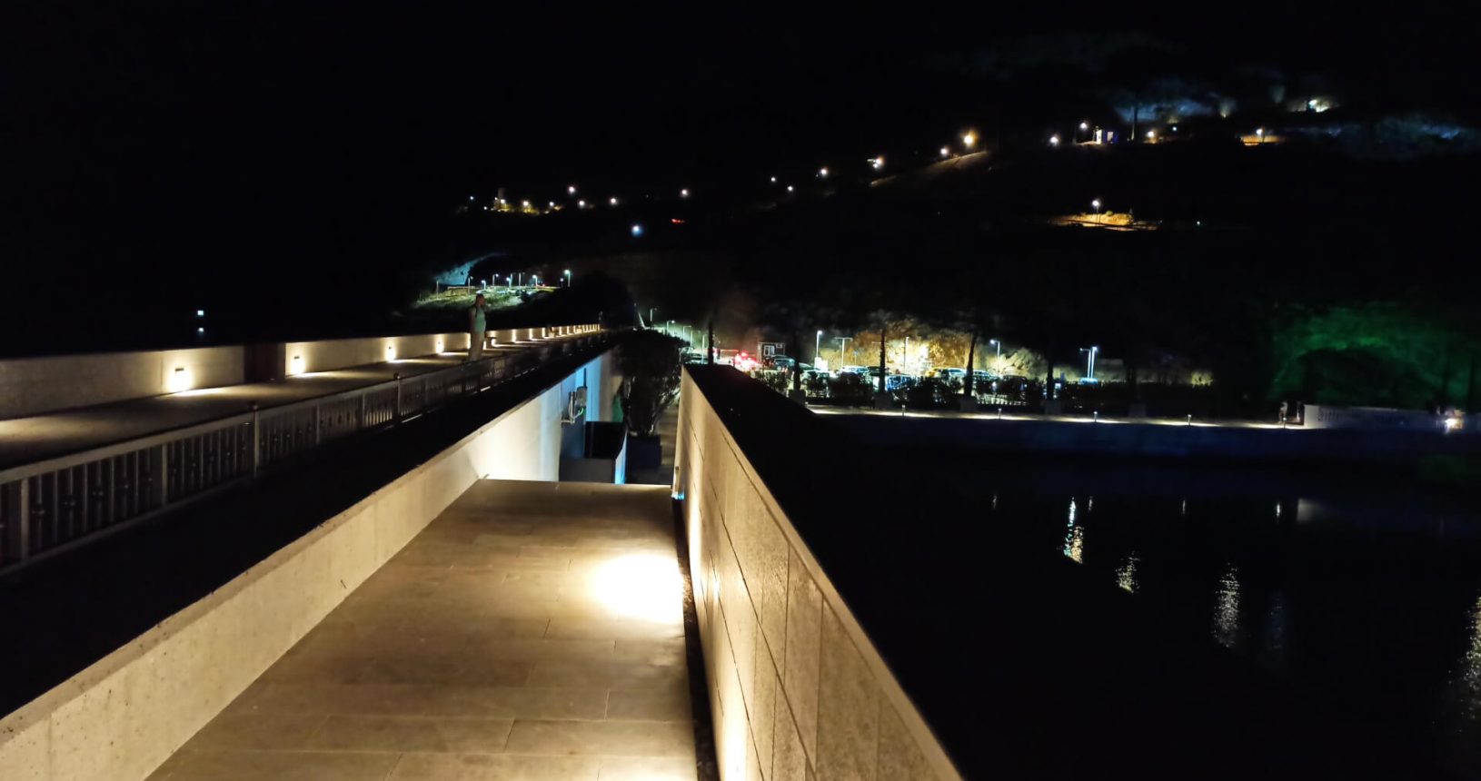 Lighthouse promenade at night at Lustica bay 1630676327296