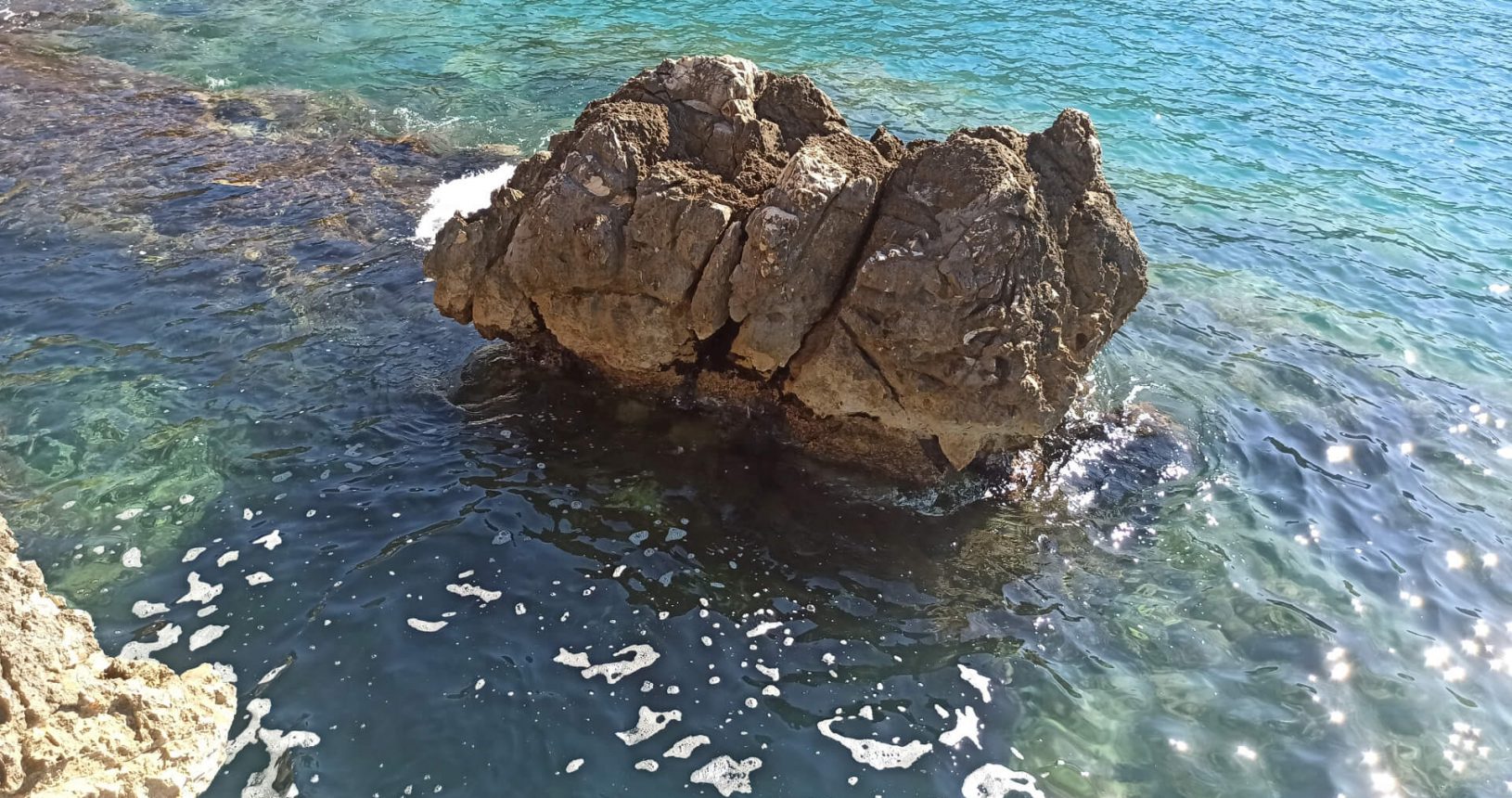 Single stone in the sea Hladna Uvala