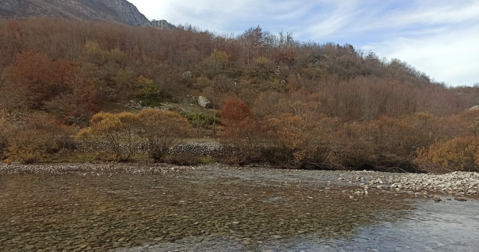 Beautiful transparent water at mountain river at national park Prokletije