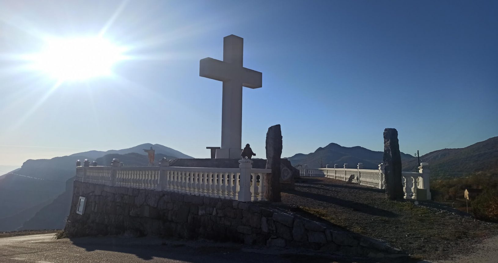 Highlighted with sun Viewpoint with big cross and Jesus