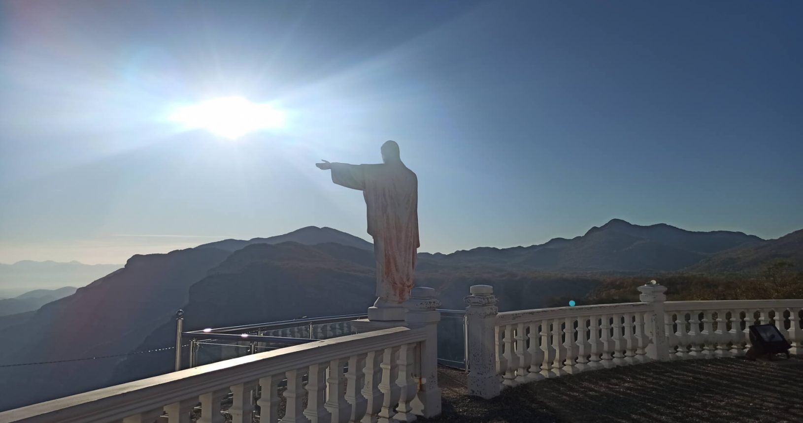 Jesus and the sun Viewpoint with big cross and Jesus