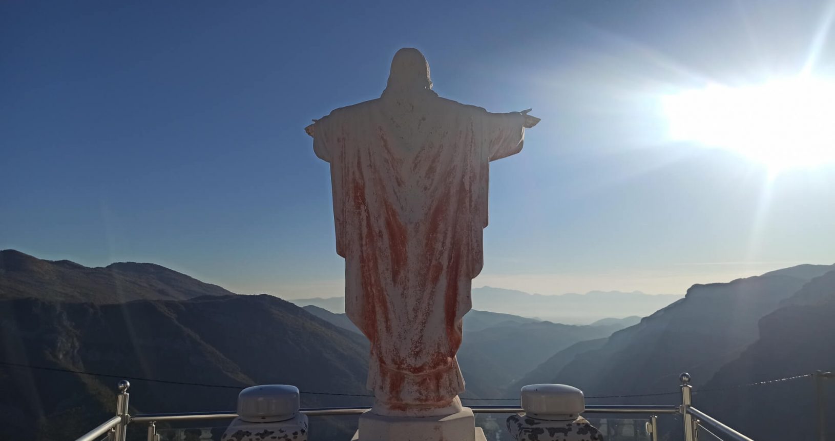 Jesus looking at the valley Viewpoint with big cross and Jesus
