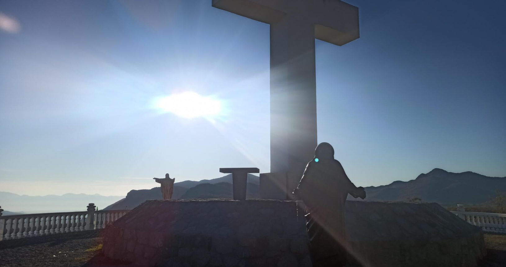Mother Teresa Jesus and cross Viewpoint with big cross and Jesus