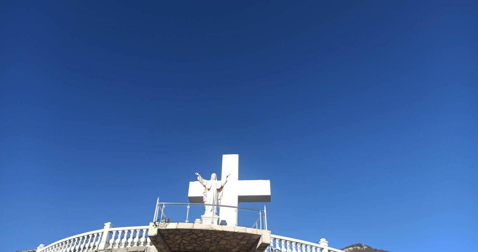 The statue of Jesus at Viewpoint with big cross and Jesus