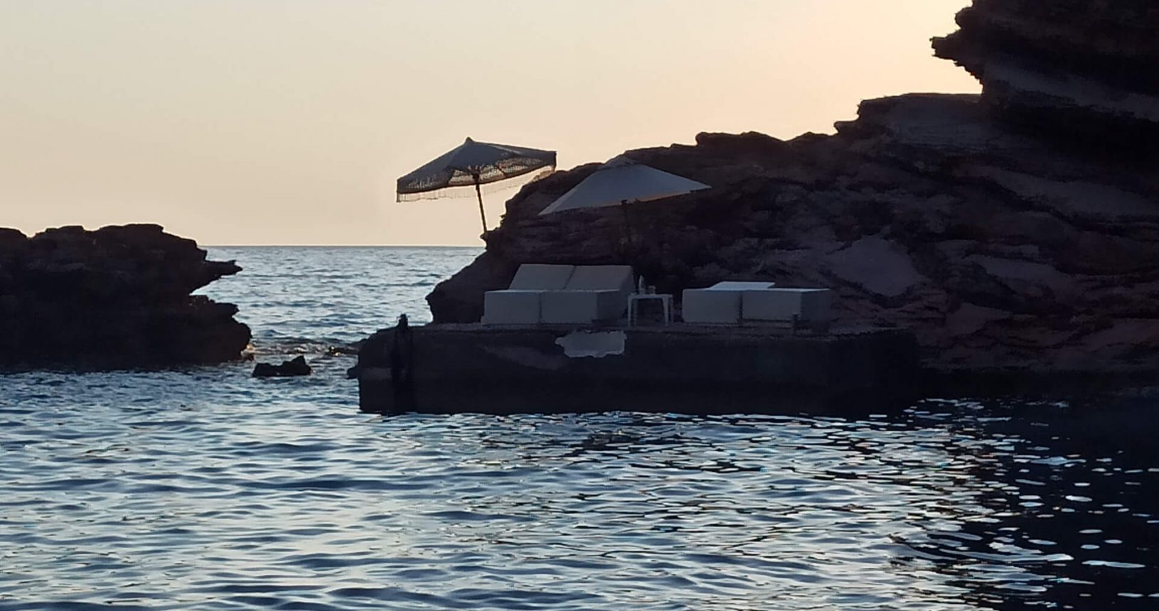 Separated sunbed at the rocks Crvena Glavica Beach