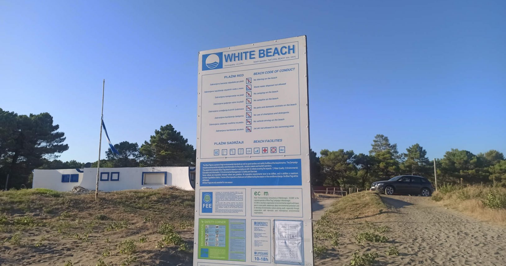 White beach sign