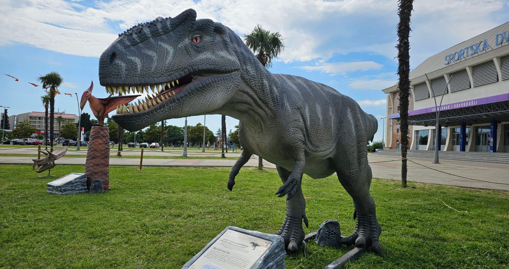 One dinosaur eating another one in Dino Park